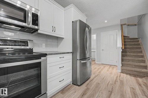 #7 10 Devon Cl, St. Albert, AB - Indoor Photo Showing Kitchen With Stainless Steel Kitchen