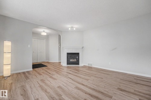 #7 10 Devon Cl, St. Albert, AB - Indoor Photo Showing Living Room With Fireplace