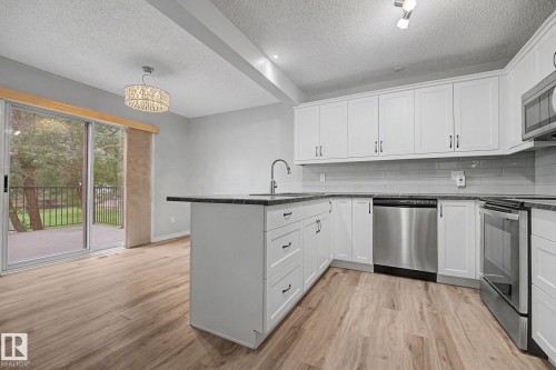 #7 10 Devon Cl, St. Albert, AB - Indoor Photo Showing Kitchen With Stainless Steel Kitchen