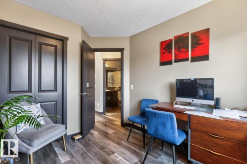 Room featuring wood-finish flooring and a neutral wall color - 3627 12 Street Nw, Edmonton, AB - Indoor Photo Showing Office