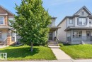 Traditional-style home with gray siding and white trim - 3627 12 Street Nw, Edmonton, AB  - Outdoor With Deck Patio Veranda With Facade 