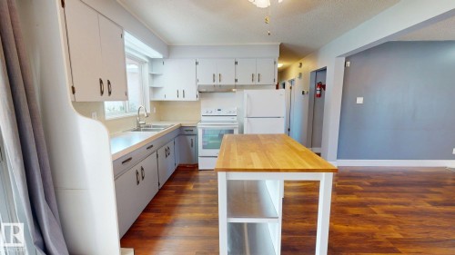 10661 152 Street Nw, Edmonton, AB - Indoor Photo Showing Kitchen With Double Sink