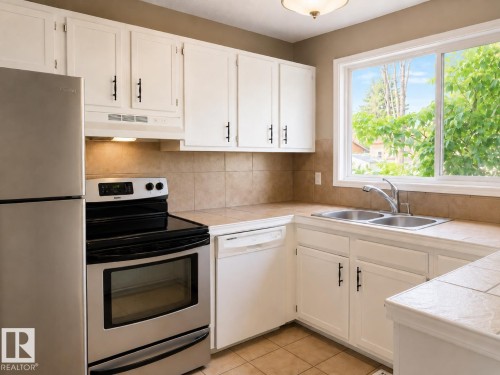 229 19 Street, Cold Lake, AB - Indoor Photo Showing Kitchen With Double Sink