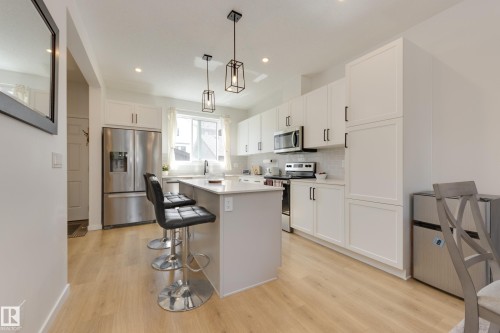 19281 22A Avenue Nw, Edmonton, AB - Indoor Photo Showing Kitchen With Stainless Steel Kitchen With Upgraded Kitchen