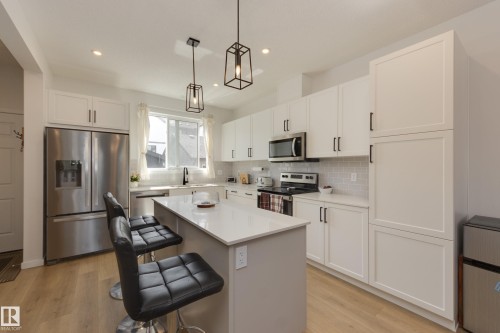 19281 22A Avenue Nw, Edmonton, AB - Indoor Photo Showing Kitchen With Stainless Steel Kitchen With Upgraded Kitchen
