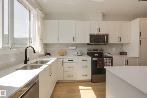 19281 22A Avenue Nw, Edmonton, AB - Indoor Photo Showing Kitchen With Double Sink