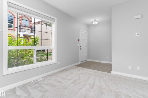 #7 13825 155 Av Nw, Edmonton, AB - Indoor Photo Showing Other Room