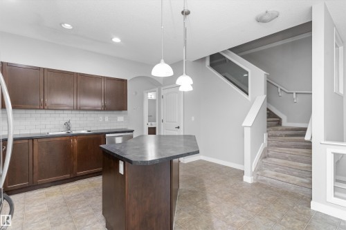 #7 13825 155 Av Nw, Edmonton, AB - Indoor Photo Showing Kitchen