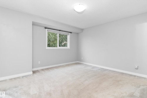 #7 13825 155 Av Nw, Edmonton, AB - Indoor Photo Showing Other Room
