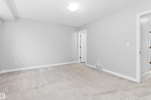 #7 13825 155 Av Nw, Edmonton, AB - Indoor Photo Showing Other Room