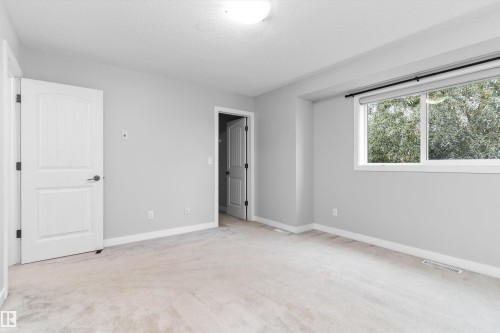 #7 13825 155 Av Nw, Edmonton, AB - Indoor Photo Showing Other Room