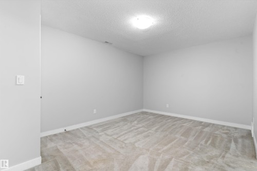 #7 13825 155 Av Nw, Edmonton, AB - Indoor Photo Showing Other Room