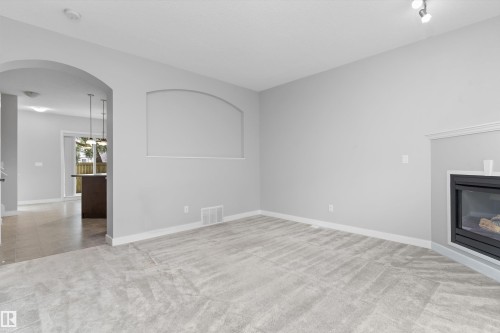 #7 13825 155 Av Nw, Edmonton, AB - Indoor With Fireplace