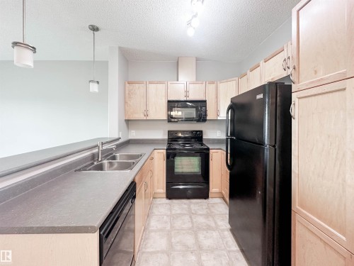 #337 7825 71 St Nw, Edmonton, AB - Indoor Photo Showing Kitchen With Double Sink