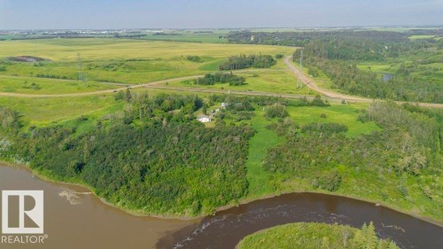 Expansive riverfront property featuring mature tree lines and open green spaces - 55319 Rge Road 222, Rural Sturgeon County, AB 