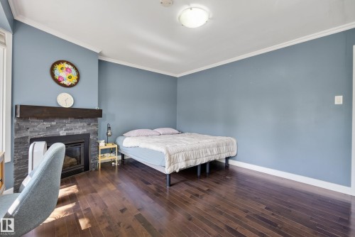 14604 93 Avenue Nw, Edmonton, AB - Indoor Photo Showing Bedroom With Fireplace