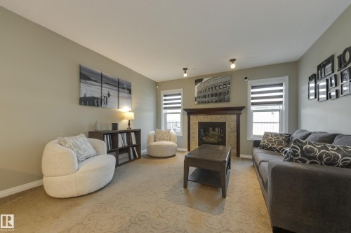5881 168A Avenue Nw, Edmonton, AB - Indoor Photo Showing Living Room With Fireplace