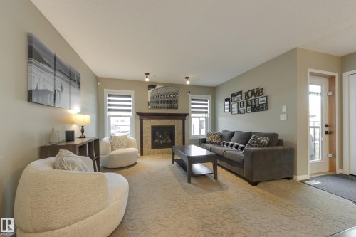 5881 168A Avenue Nw, Edmonton, AB - Indoor Photo Showing Living Room With Fireplace