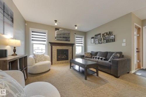 5881 168A Avenue Nw, Edmonton, AB - Indoor Photo Showing Living Room With Fireplace