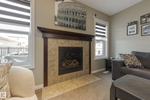 5881 168A Avenue Nw, Edmonton, AB - Indoor Photo Showing Living Room With Fireplace