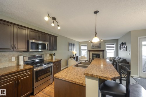 5881 168A Avenue Nw, Edmonton, AB - Indoor Photo Showing Kitchen With Stainless Steel Kitchen With Double Sink