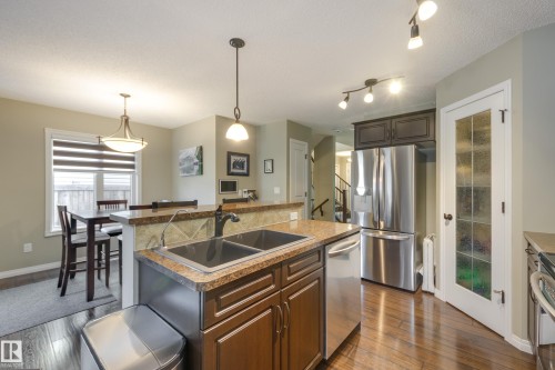 5881 168A Avenue Nw, Edmonton, AB - Indoor Photo Showing Kitchen With Stainless Steel Kitchen With Double Sink