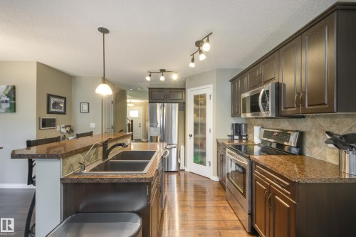 5881 168A Avenue Nw, Edmonton, AB - Indoor Photo Showing Kitchen With Double Sink