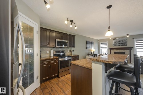 5881 168A Avenue Nw, Edmonton, AB - Indoor Photo Showing Kitchen With Stainless Steel Kitchen