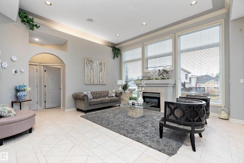15816 64 Street Nw, Edmonton, AB - Indoor Photo Showing Living Room With Fireplace