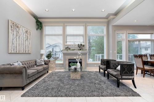 15816 64 Street Nw, Edmonton, AB - Indoor Photo Showing Living Room With Fireplace