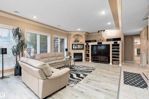 15816 64 Street Nw, Edmonton, AB - Indoor Photo Showing Living Room With Fireplace