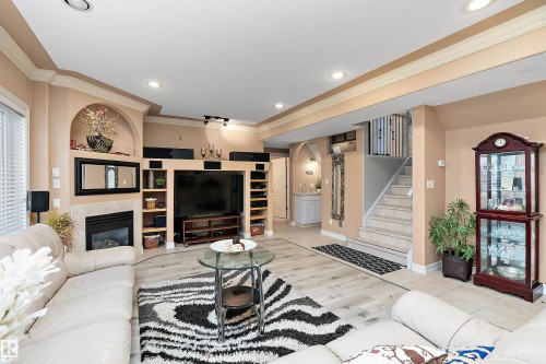 15816 64 Street Nw, Edmonton, AB - Indoor Photo Showing Living Room With Fireplace