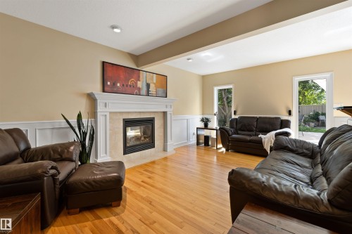 26 Eastbourne Close, St. Albert, AB - Indoor Photo Showing Living Room With Fireplace