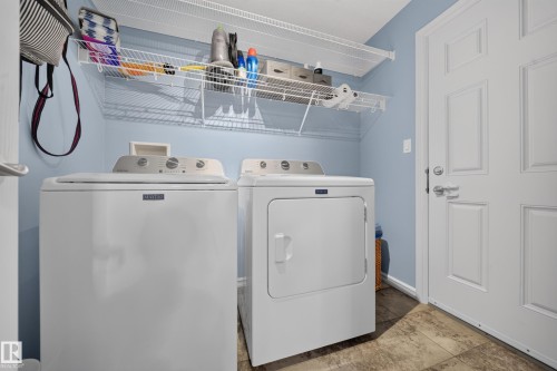 90 Rue Montalet, Beaumont, AB - Indoor Photo Showing Laundry Room