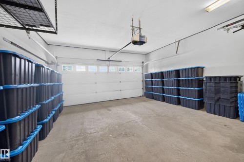 90 Rue Montalet, Beaumont, AB - Indoor Photo Showing Garage