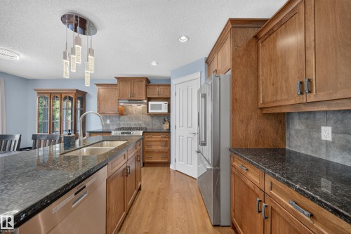 90 Rue Montalet, Beaumont, AB - Indoor Photo Showing Kitchen With Double Sink