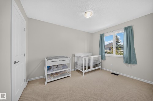90 Rue Montalet, Beaumont, AB - Indoor Photo Showing Bedroom