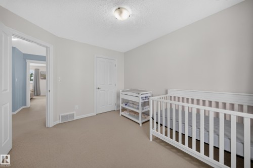 90 Rue Montalet, Beaumont, AB - Indoor Photo Showing Bedroom