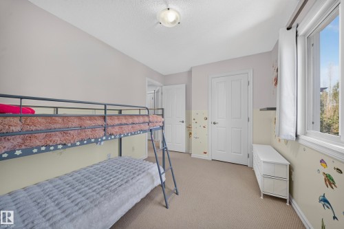 90 Rue Montalet, Beaumont, AB - Indoor Photo Showing Bedroom