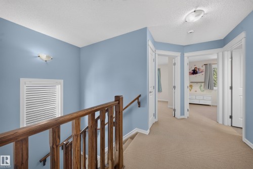 90 Rue Montalet, Beaumont, AB - Indoor Photo Showing Other Room