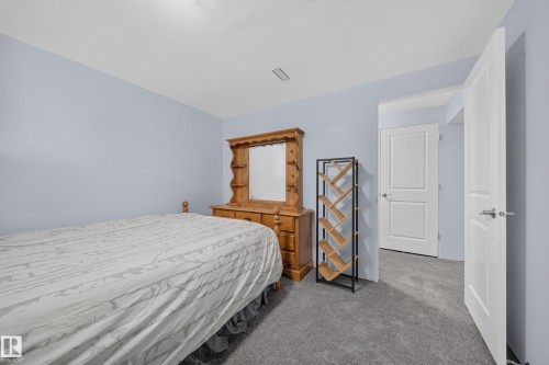 90 Rue Montalet, Beaumont, AB - Indoor Photo Showing Bedroom