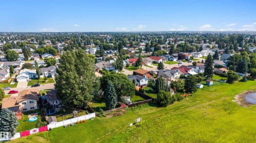 Expansive residential area with numerous detached properties, green spaces, and mature tree coverage - 4639 10 Avenue Nw, Edmonton, AB - Outdoor With View