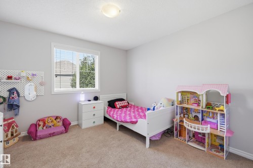 Bedroom featuring light gray walls and neutral carpet - 3606 Whitelaw Bay Nw, Edmonton, AB - Indoor Photo Showing Bedroom