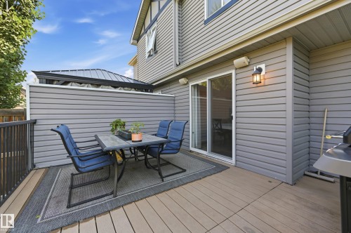 Spacious outdoor deck featuring composite decking and a privacy wall - 3606 Whitelaw Bay Nw, Edmonton, AB - Outdoor With Deck Patio Veranda With Exterior
