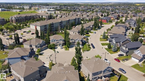 Residential neighborhood featuring detached single-family homes and multi-story apartment buildings - 3606 Whitelaw Bay Nw, Edmonton, AB - Outdoor With View