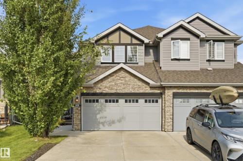 Stone and siding exterior with gabled roof lines - 3606 Whitelaw Bay Nw, Edmonton, AB - Outdoor With Facade