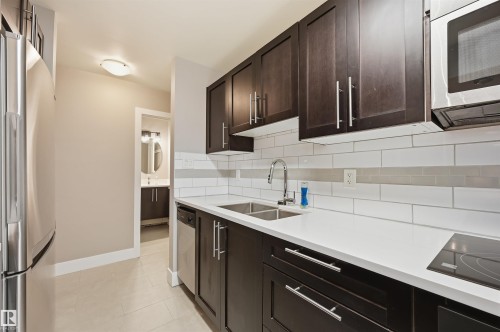 #1 10015 83 Av Nw Nw, Edmonton, AB - Indoor Photo Showing Kitchen With Double Sink With Upgraded Kitchen