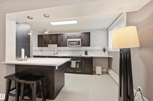#1 10015 83 Av Nw Nw, Edmonton, AB - Indoor Photo Showing Kitchen With Upgraded Kitchen