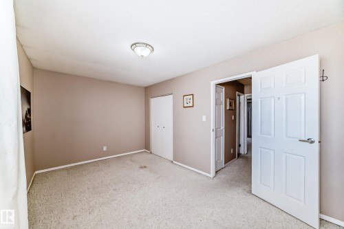 100 Dickinsfield Crest Nw, Edmonton, AB - Indoor Photo Showing Other Room