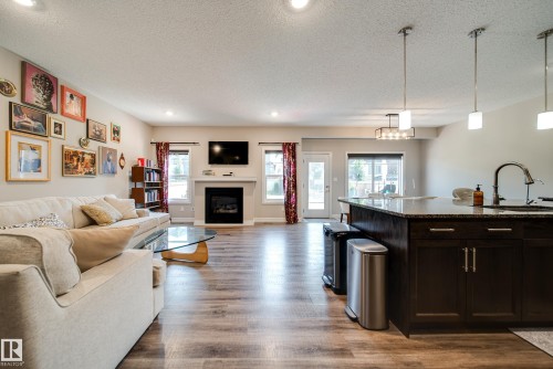 3632 Keswick Boulevard Sw, Edmonton, AB - Indoor Photo Showing Living Room With Fireplace
